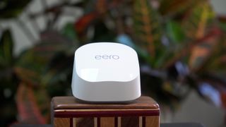 eero 6+ on a wooden box