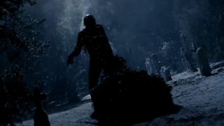 Tarman walking with a Christmas tree in the Return of the Living Dead trailer