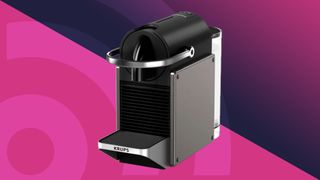 Nespresso Pixie by Krups coffee machine on pink background