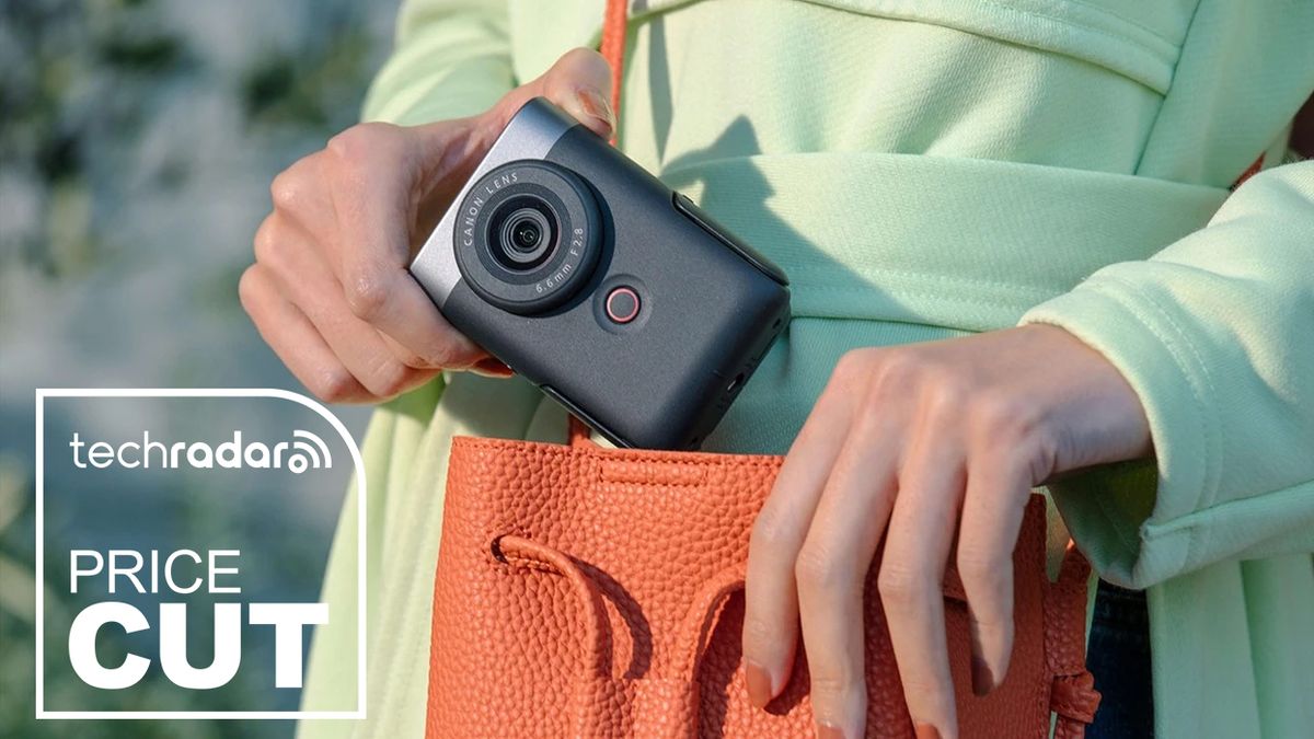 A woman taking the Canon PowerShot V10 out of a small bag with the TechRadar deals logo for price cut