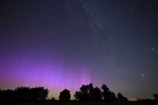 Northern Lights (Aurora Borealis), and the Perseid meteor occurs, observed at the Gulpe Sternenpark in Havelaue, Havelland district of Brandenburg, Germany on August 13, 2024.