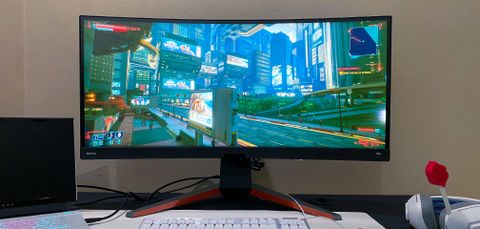 BenQ Mobiuz EX3415R on a gaming desk