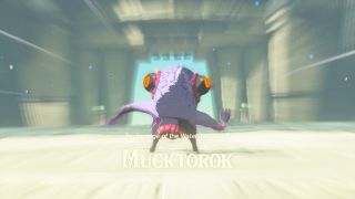 Water temple boss Mucktorok standing by gate entrance