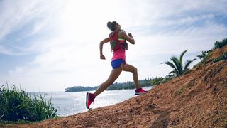 Woman running uphill