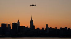 A drone hovers above the Hudson river, which lies between the New York City borough of Manhattan and Hoboken, New Jersey