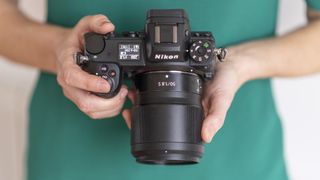 Top-down view of the Nikon Z6 II in a person's hands