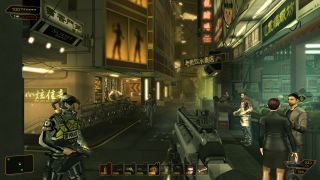 A player walking through a city during Deus Ex: Human Revolution, one of the best PS3 games.