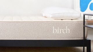 The Birch Natural mattress on a bed