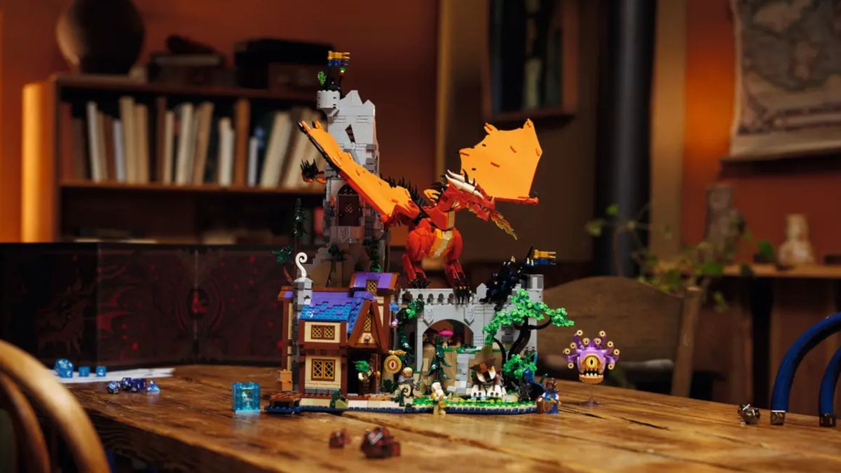 The Lego D&amp;D set and minifigures laid out on a wooden table strewn with dice