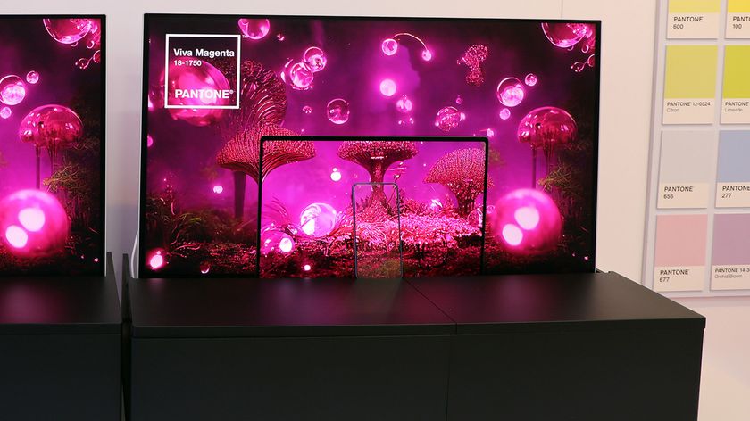 Samsung&#039;s &quot;Seamless Color Studio&quot; highlights how modern OLEDs from TVs to smartphones can maintain perfect, color-calibrated consistency across any screen size— in this case across a 31.5-inch monitor, a 16-inch laptop, and a 6.7-inch smartphone.