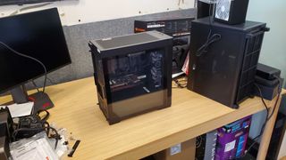 black gaming PC with glass side