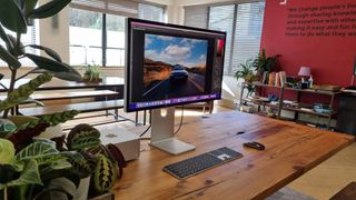 Studio Display on wooden desk