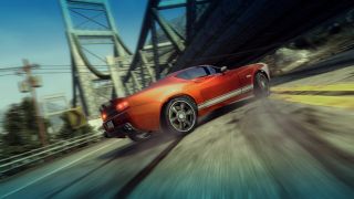 A red car racing during Burnout Paradise, one of the best PS3 games.