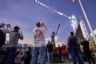 Baseball fans watch the total eclipse over Cleveland, Ohio