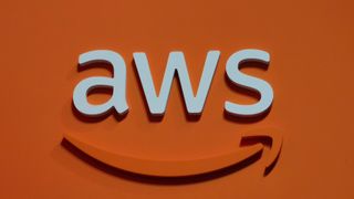 The AWS logo on an orange background