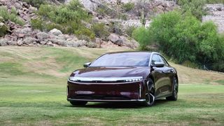 Car parked on grass at an angle