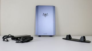 The AtomMan G7 Ti mini PC unboxed with its stand and power supply