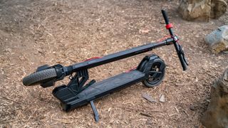 TurboAnt V8 Dual-Battery Electric Scooter at a park