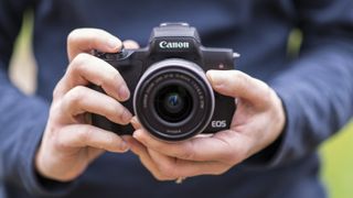 Canon EOS M50 in the hand