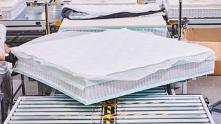 A hybrid mattress being assembled on the factory line at 3Z Brands in Arizona, US