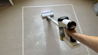 vacuuming flour on carpet