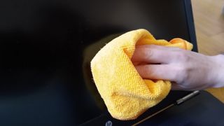 A microfiber cloth on a laptop screen