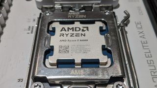 AMD Ryzen 5 8600G inserted into a motherboard