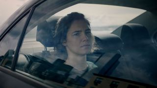 Billede af Amanda Knox i en bil