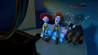 Jessie, Bullseye and Woody watching TV in Toy Story 2.