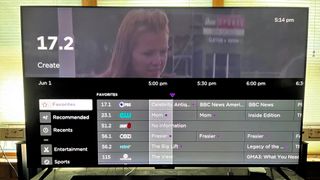 Roku Plus Series TV Live TV program guide shown onscreen