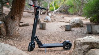 TurboAnt V8 Dual-Battery Electric Scooter at a park