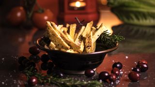 Air fried fries with olives and rosemary