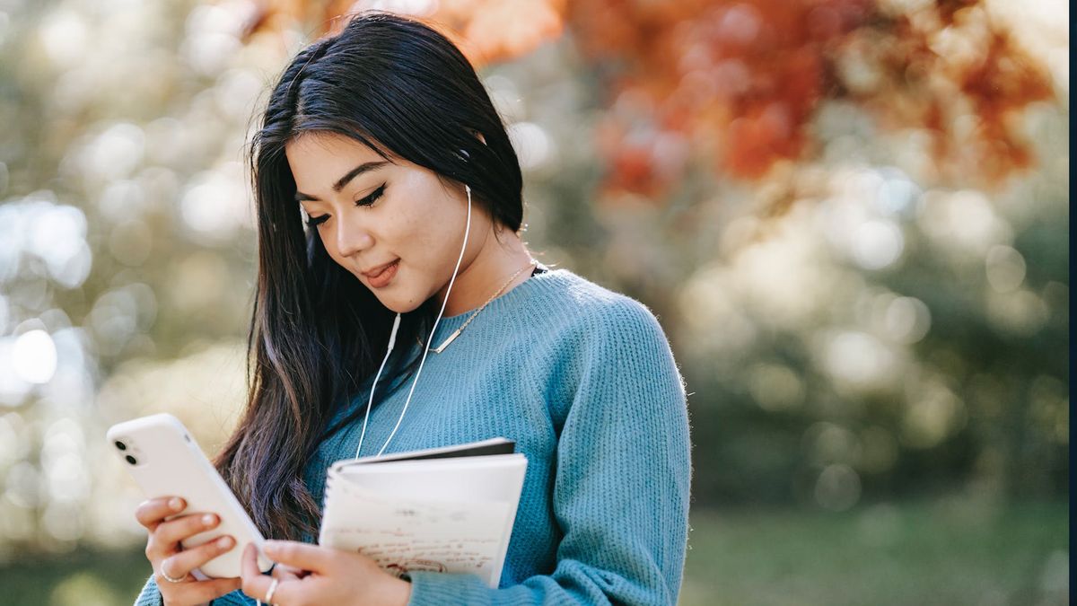 Woman looking at smartphone