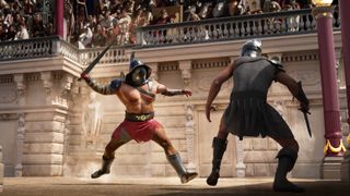 Two gladiators fight in an arena