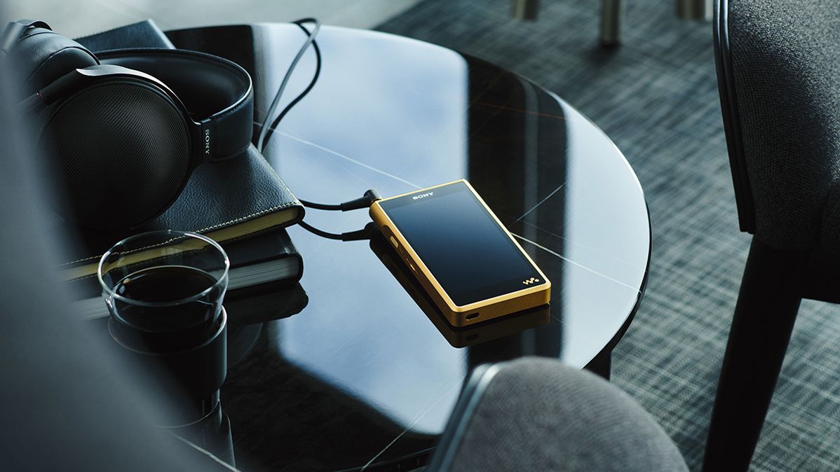 the gold-plated sony walkman on a table