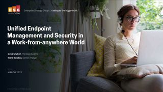 Whitepaper cover with image of female working remotely at a laptop on her sofa