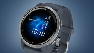 The Garmin Venu 2 watch on a blue background