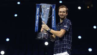 Daniil Medvedev posing with the ATP Final trophy