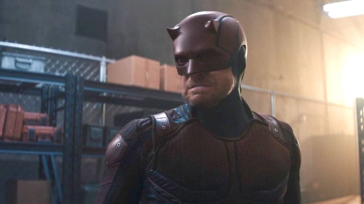 Dardevil grimaces in a warehouse as he looks at an off-camera Maya Lopez in Marvel&#039;s Echo TV show