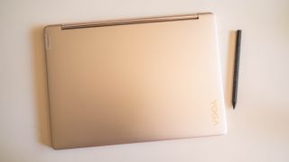 Lenovo Yoga 9i Gen 8 on a coffee table