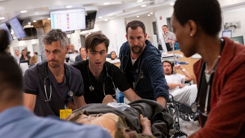 ER doctors, including Dr. Michael &quot;Robby&quot; Rabinavitch (Noah Wyle) attend to a patient in The Pitt