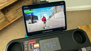 DeerRun A1 Pro treadmill console with an iPad running the PitPat app