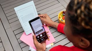 Woman using Guided Frame to read document