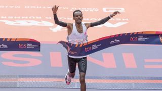 Tamirat Tola of Ethiopia crossing finish line as a winner with time 2:04:58 of TCS New York City marathon in open men's division in Central Park. Tola sets NYC Marathon course record to win men's race. 