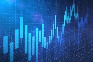 Close up of stock market chart and worried atmosphere on a dark background