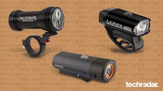 best bike lights: Pictired here, three bike lights on tan background