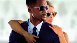 "Focus" key art featuring Will Smith and Margot Robbie (behind)