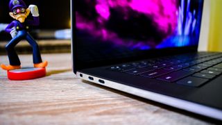 Dell XPS 15 (2020) on a wooden coffee table