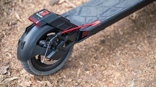 TurboAnt V8 Dual-Battery Electric Scooter at a park