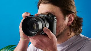 The Fujifilm GFX100S II in hand